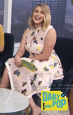 Carissa’s white floral asymmetric hem dress on E! News Daily Pop
