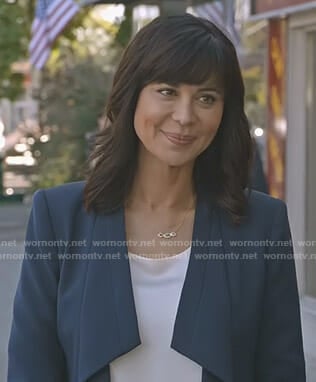 Cassie’s navy draped jacket on Good Witch