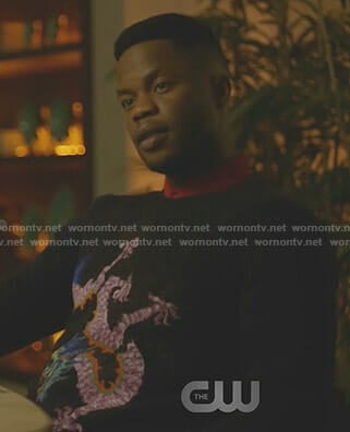 Jeff’s navy dragon sweater on Dynasty