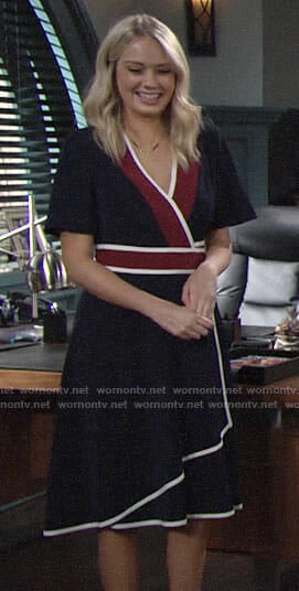 Abby’s navy wrap dress with white trim on The Young and the Restless