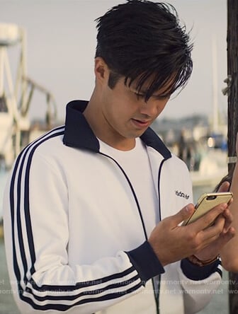 Zach’s white Adidas track jacket on 13 Reasons Why