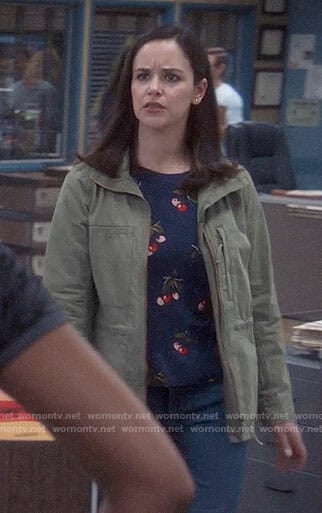 Amy’s cherry print sweater and army jacket on Brooklyn Nine-Nine