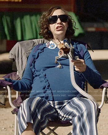 Carol’s blue ruffled sweater and striped pants on Last Man on Earth