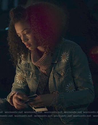 Nina’s daisy patch denim jacket on 13 Reasons Why