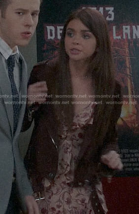 Haley’s pink floral ruffled dress and suede jacket on Modern Family