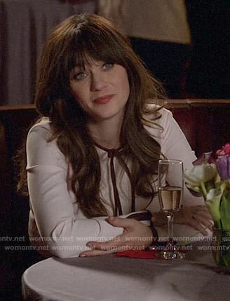 Jess’s pink bow neck dress on New Girl