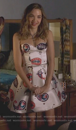 Cassandra’s white strapless print dress on Famous in Love