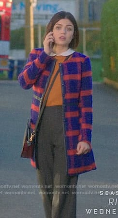 Stella’s blue and red checked coat on Life Sentence