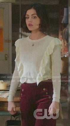Stella’s ruffled sweater and red corduroy pants on Life Sentence