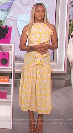 Eve’s yellow floral print ruffle front dress on The Talk