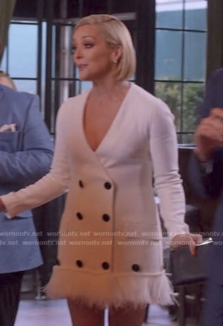 Jacqueline’s white feather trimmed blazer dress on Unbreakable Kimmy Schmidt