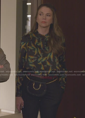 Liza’s black leaf print shirt and waist bag on Younger