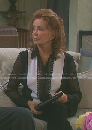 Maggie’s black lace inset blouse with sheer sleeves on Days of our Lives