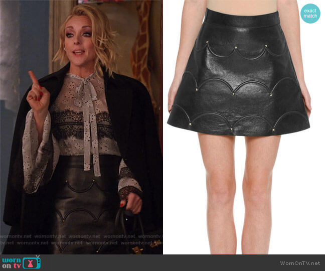 Valentino Scalloped Rockstud Leather A-Line Miniskirt worn by Jacqueline Voorhees (Jane Krakowski) on Unbreakable Kimmy Schmidt