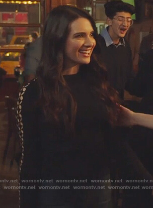 Jane’s black cutout sleeves sweater on The Bold Type