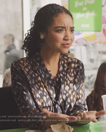 Kat’s black leopard print tie neck blouse on The Bold Type