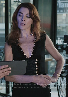 Kitty’s black lace-up front embellished dress on Dietland