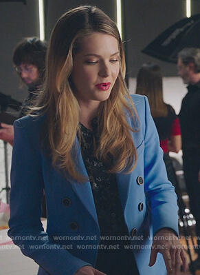 Sutton’s blue button detail blazer and black floral print blouse on The Bold Type
