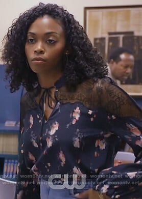 Anissa’s navy floral lace inset top on black lightning