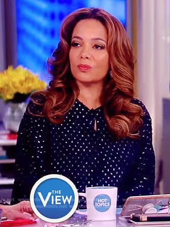 Sunny’s blue keyhole embellished blouse on The View