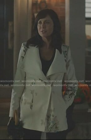 Cassie’s white floral coat on Good Witch