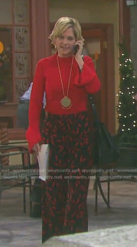 Eve’s red bell sleeve top and printed wide-leg pants on Days of our Lives