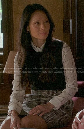 Joan’s checked shirt and plaid skirt on Elementary