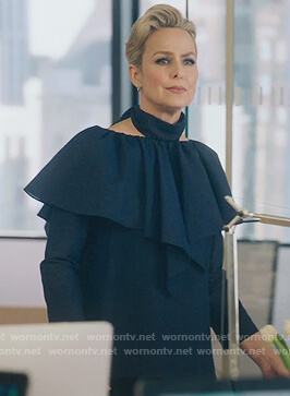 Jacqueline’s navy ruffle tie neck top on The Bold Type
