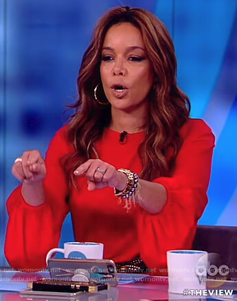 Sunny’s red long sleeve blouson dress on The View