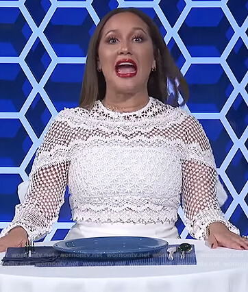 Adrienne’s white lace long sleeve dress on The Real