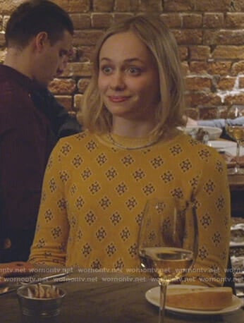 Caitlin’s yellow printed sweater on Younger
