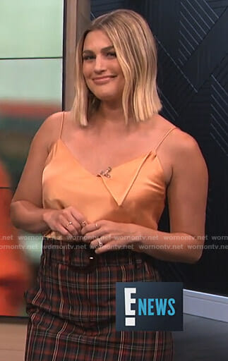 Carissa’s orange camisole and checked mini skirt on E! News