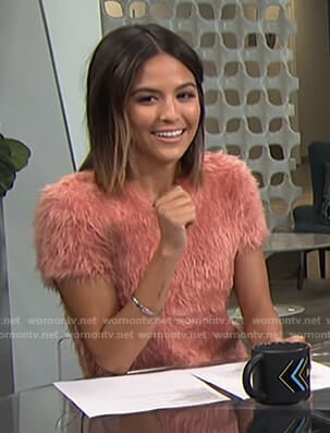 Erin’s pink fluffy top on Live from E!