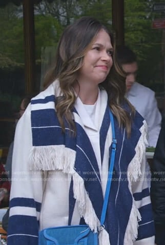 Liza’s white and blue striped fringe coat on Younger
