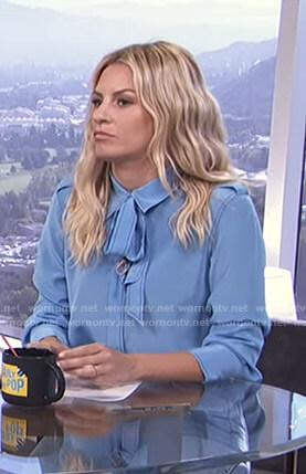 Morgan’s blue tie neck blouse on E! News Daily Pop