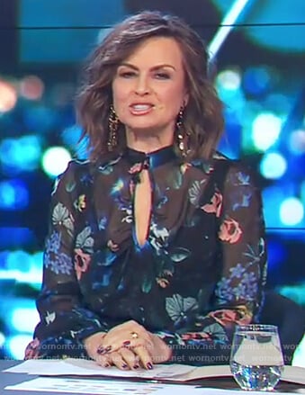 Lisa’s black floral print key hole blouse on The Project