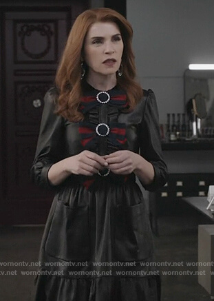 Kitty’s black leather bow embellished dress on Dietland