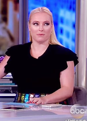 Meghan’s black metallic top and striped sequin skirt on The View