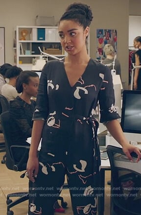 Kat’s black print v-neck jumpsuit on The Bold Type