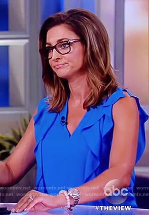 Paula’s blue ruffle front top on The View