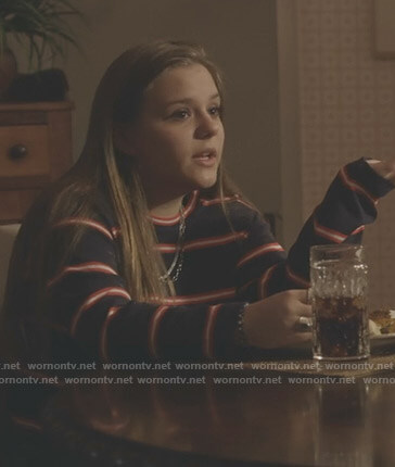 Daphne’s navy striped long sleeve top on Nashville