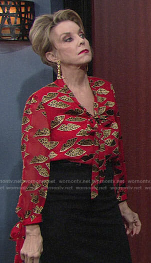Gloria’s red blouse with leopard print lips on The Young and the Restless