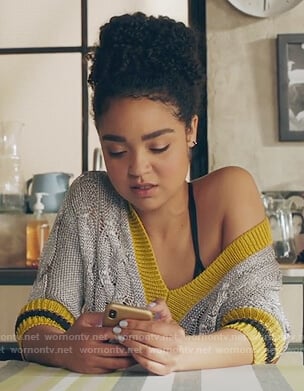 Kat’s gray v-neck sweater and double belted pants on The Bold Type
