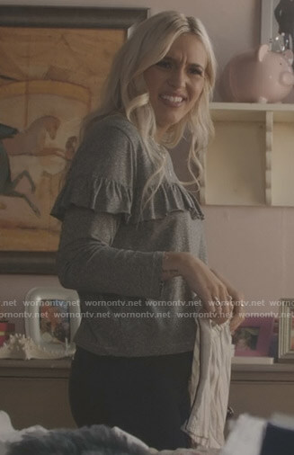 Maddie’s grey ruffled long sleeve top on Nashville