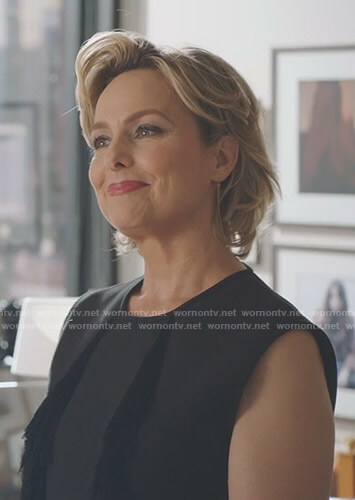 Jacqueline’s black fringed peplum top on The Bold Type