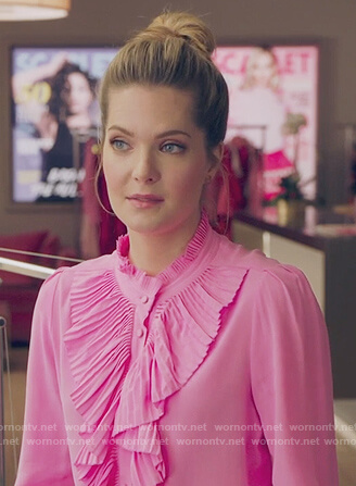 Sutton’s pink ruffle front blouse on The Bold Type