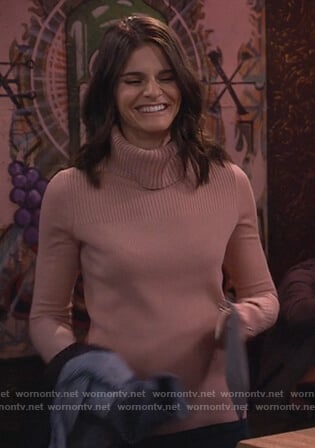 Leslie’s pink turtleneck sweater on Living Biblically
