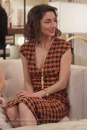 Delia’s orange v-neck geometric print dress on Girlfriends Guide to Divorce