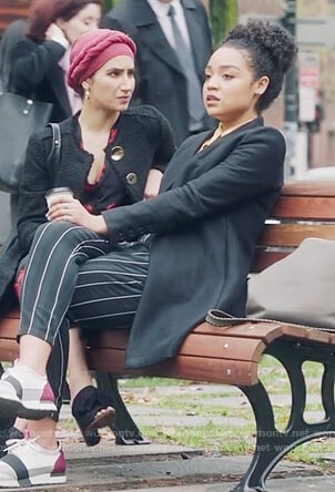 Kat’s striped pants and white sneakers on The Bold Type