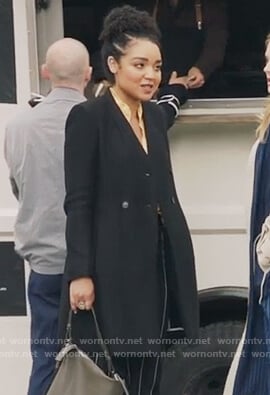 Kat’s black three button wool coat on The Bold Type